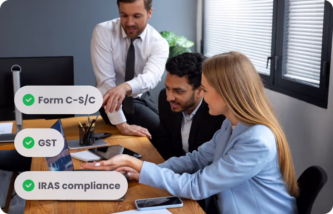 Three professionals collaborate at a desk, with tags like “Form C - s/C,”“GST,”and “IRAS compliance.”They represent ccMonet’s tax and compliance experts, leveraging AI tools to ensure SMEs meet regulatory requirements, manage financial data accurately, and streamline tax - related workflows.